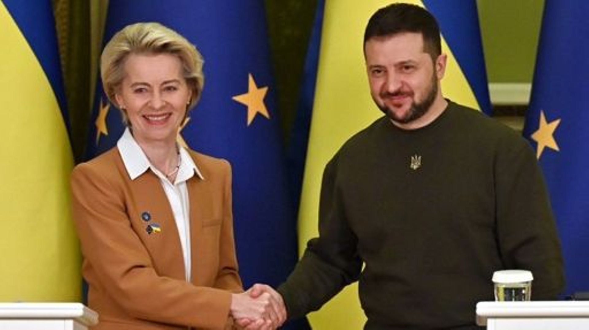Ukrainian President Volodymyr Zelensky and President of the European Commission Ursula von der Leyen shake hands after a joint press conference after talks in Kyiv on February 2, 2023. The European Commission chief announced she had arrived in Kyiv with a
