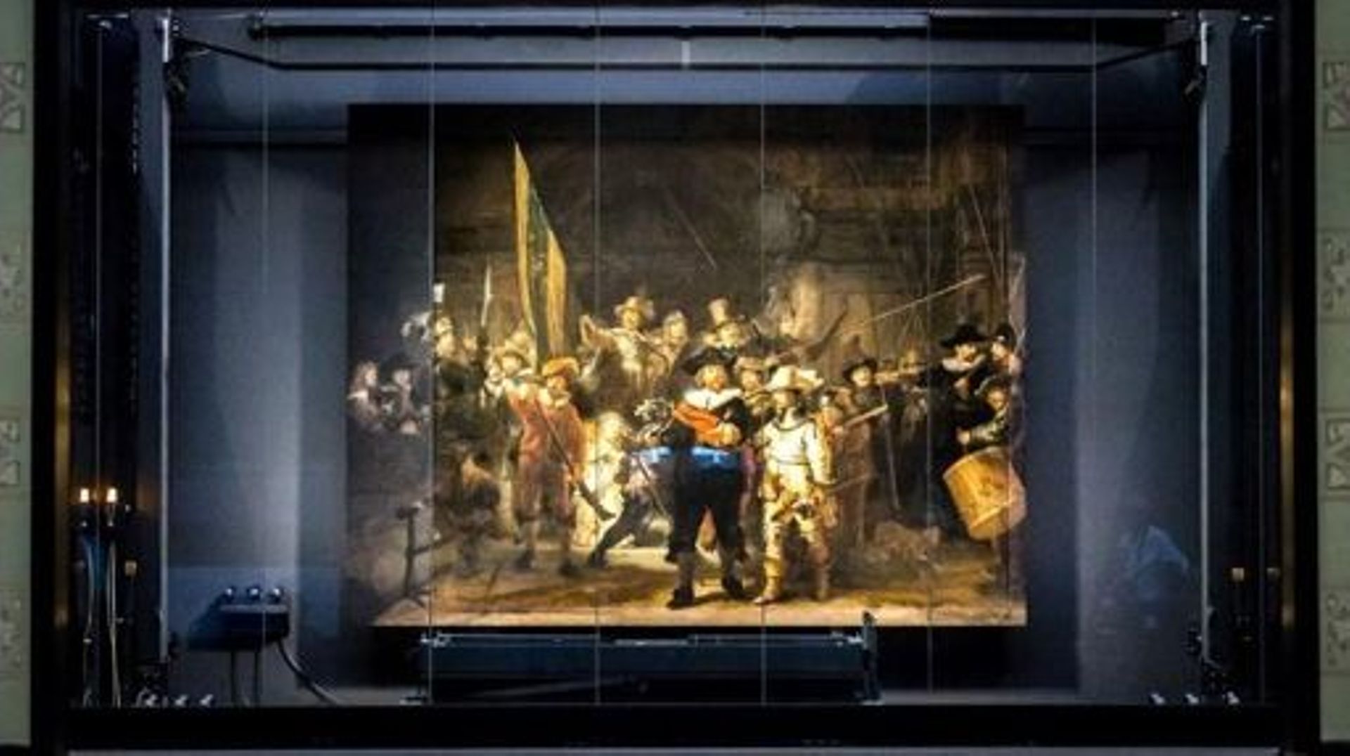 The remounted 1642 'Night Watch' is put in place at the Rijksmuseum Museum during 'Operation Night Watch',  the largest ever investigation into the painting by Dutch master Rembrandt in Amsterdam on June 22, 2021.   Using advanced technology the museum is
