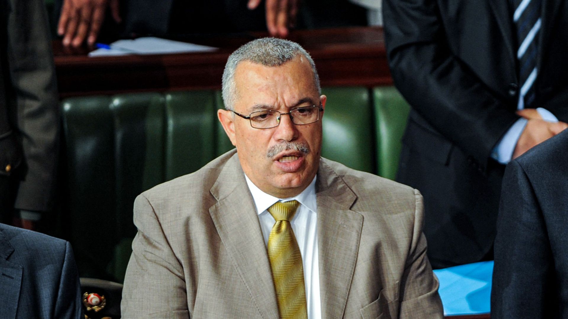 Noureddine Bhiri, alors conseiller du Premier ministre tunisien, ;assiste à une séance parlementaire à l'Assemblée constituante dans la capitale Tunis.