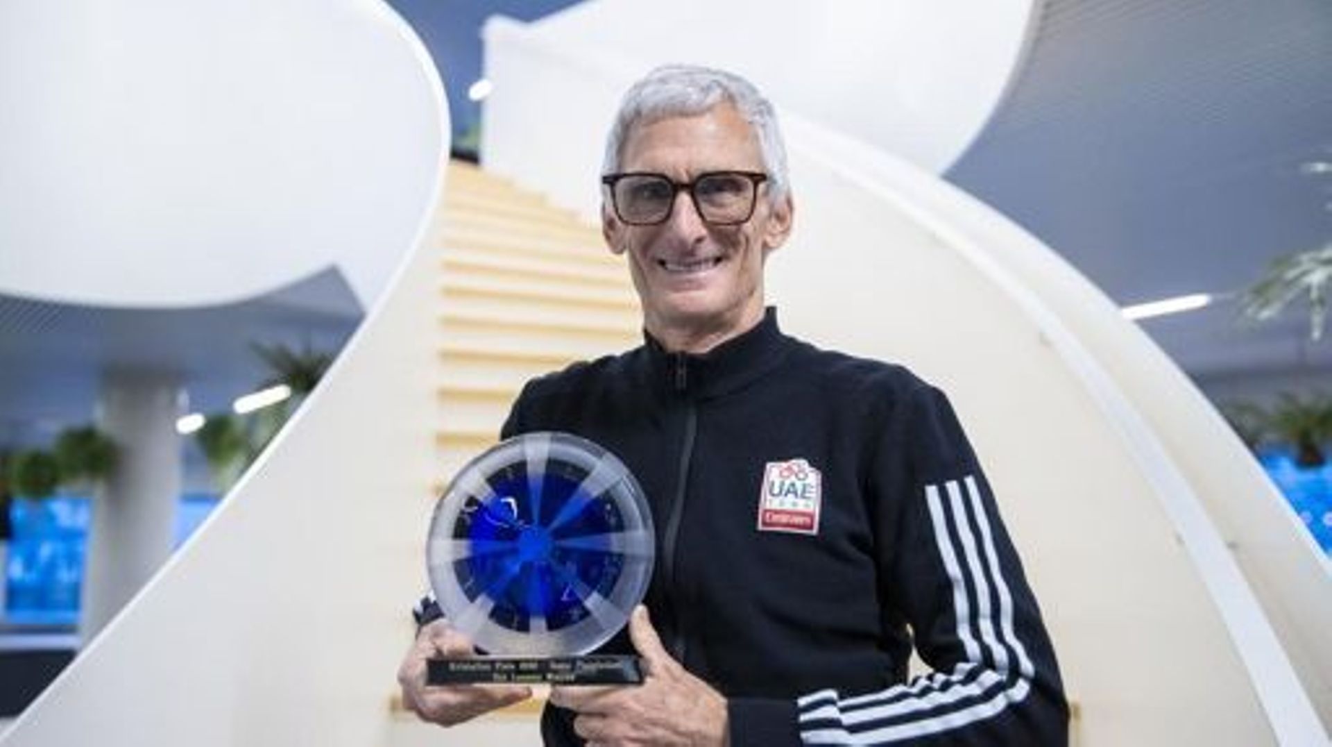 ATTENTION EDITORS - HAND OUT PICTURES - EDITORIAL USE ONLY - MANDATORY CREDIT DPG MEDIA  Hand out picture released on Monday 14 December 2020, by DPG Media shows UAE Team Emirates sports director Allan Peiper posing with the 'Beste Ploegleider' award (bes