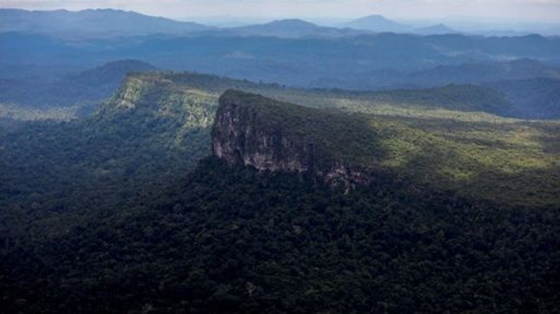 Aerial view of Amazonia rainforest at the Yanomami indigenous territory in the state of Roraima, Brazil on February 2, 2023. At a hospital in the Brazilian Amazon, Yanomami children convalesce on hammocks. The cases of malnutrition and child malaria in th