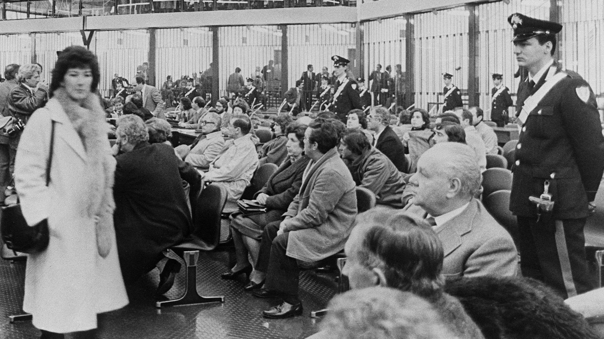 A picture taken 10 February 1986 shows the crowd in the courtroom inside the bunker built into the Ucciardone prison in Palermo as the big trial against 474 people accused of Mafia activity started in Sicilia. The accused men are locked in the steel cages