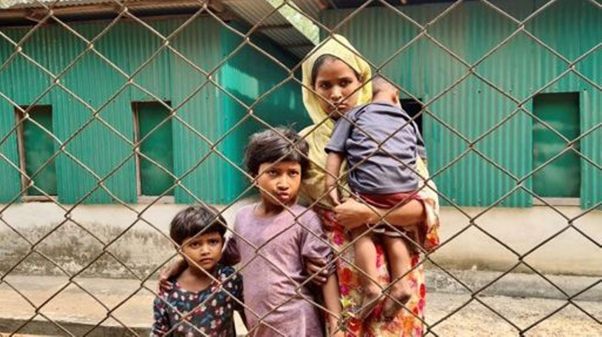 A Rohingya family arrives for a meeting with the Myanmar officials in Teknaf on March 15, 2023. Myanmar officials were meeting with Rohingya refugees on March 15 in what Bangladeshi authorities said was the revival of a long-stalled effort to return the p