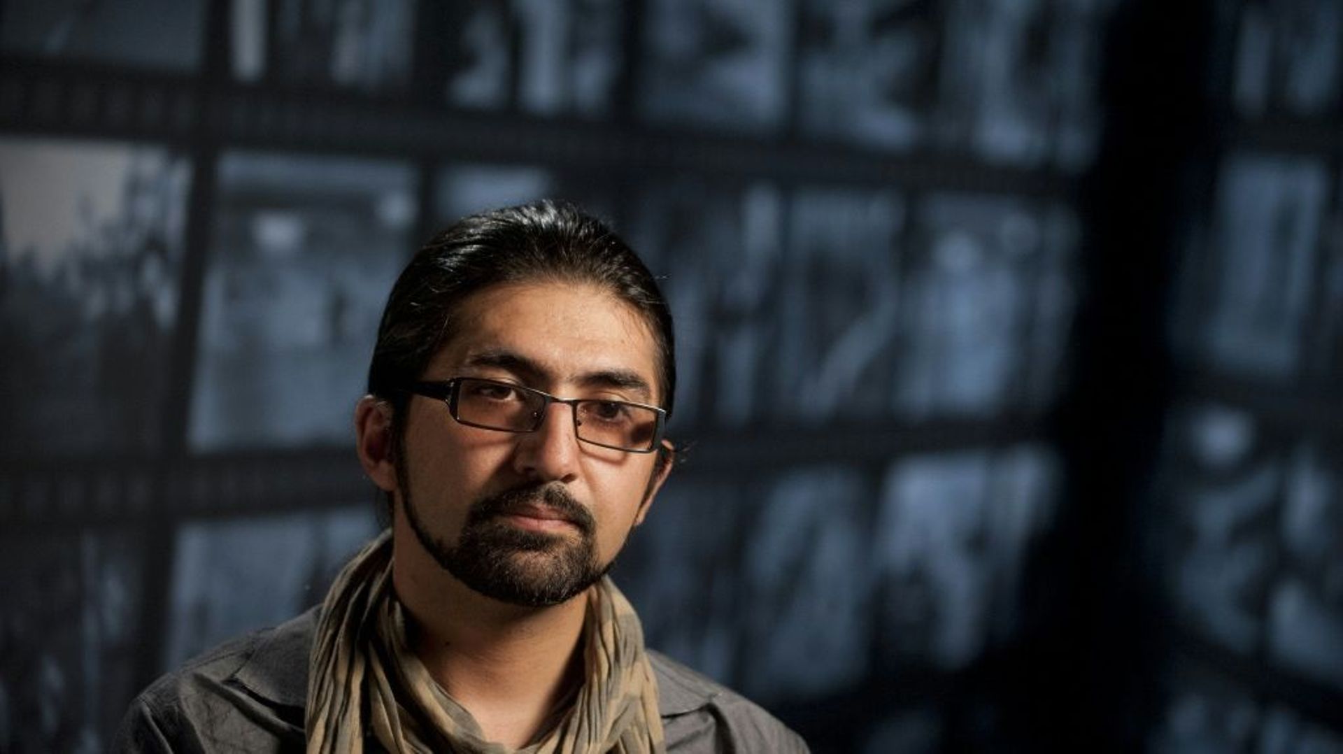 Le photographe Massoud Hossaini discute de la photo qui lui a valu le prix Pulitzer, au Newseum à Washington (Etats-Unis), le 24 mai 2012