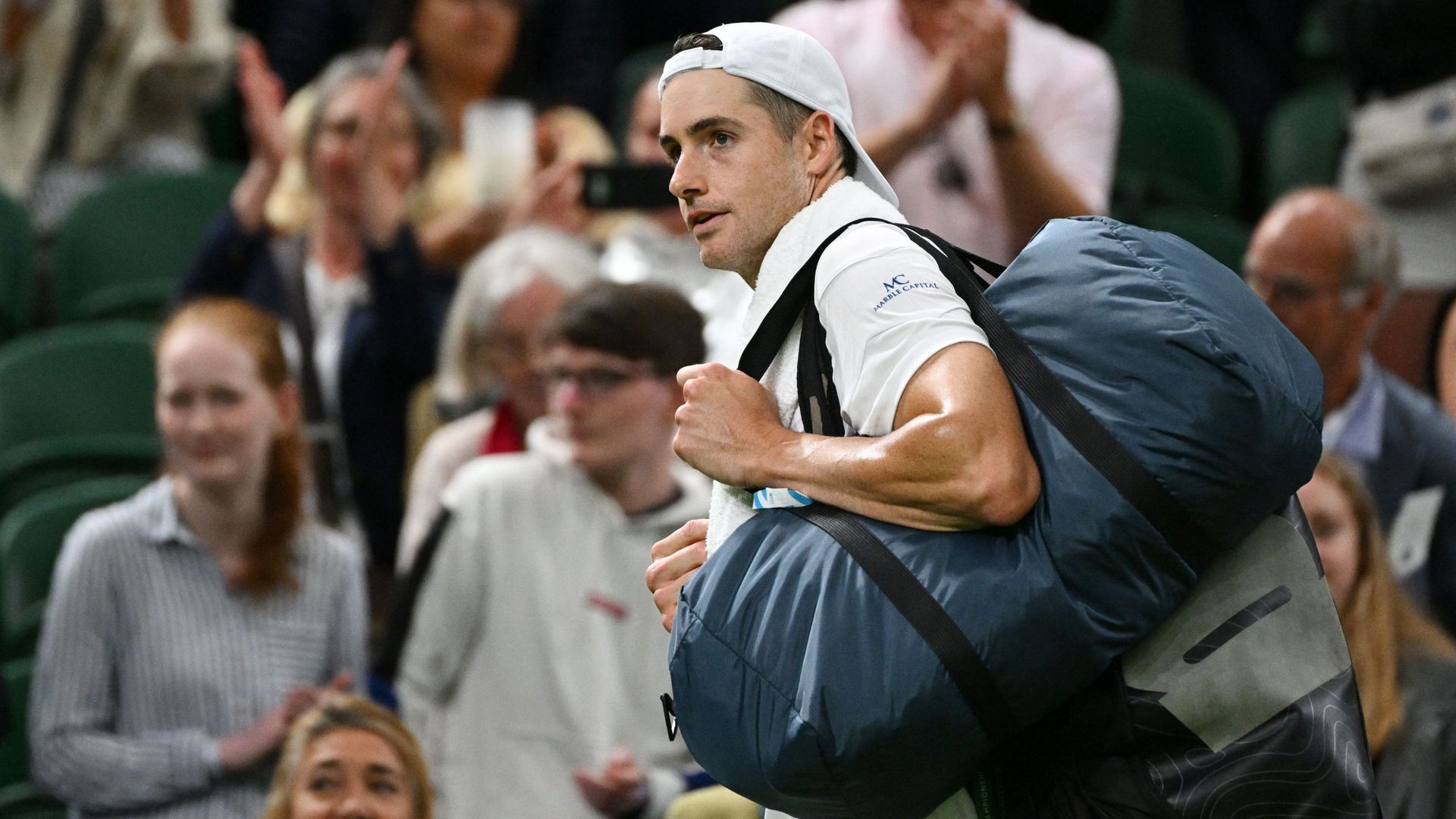 John Isner breaks career aces record but loses against Sinner who will challenge Alcaraz in 8th