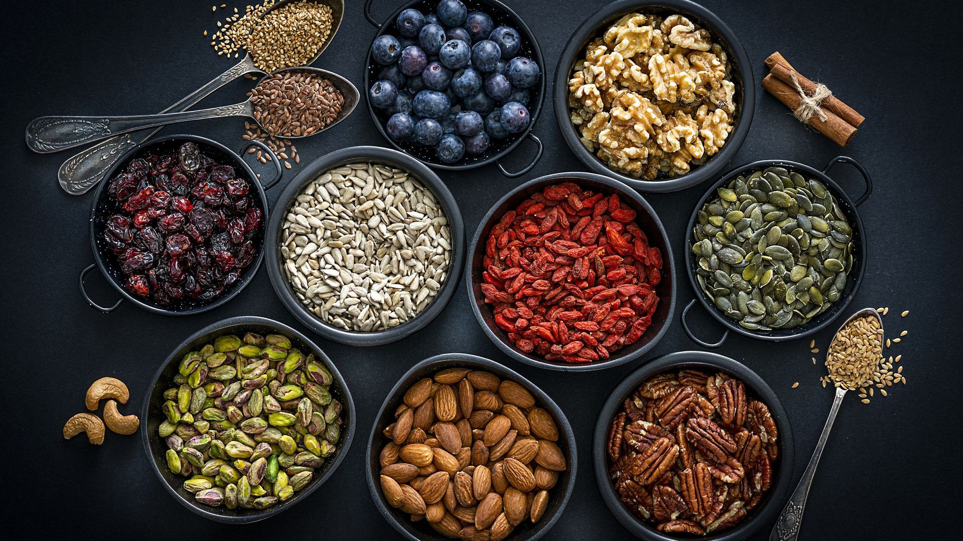 Healthy eating: assortment of nuts, seeds and fruits. Top view.