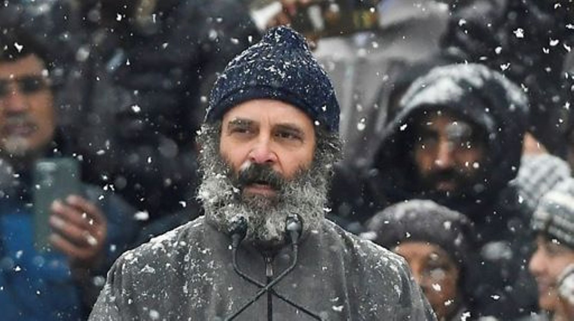 India’s Congress party leader Rahul Gandhi speaks at a public meeting amid heavy snowfall as he concludes the 'Bharat Jodo Yatra' march in Srinagar on January 30, 2023. TAUSEEF MUSTAFA / AFP