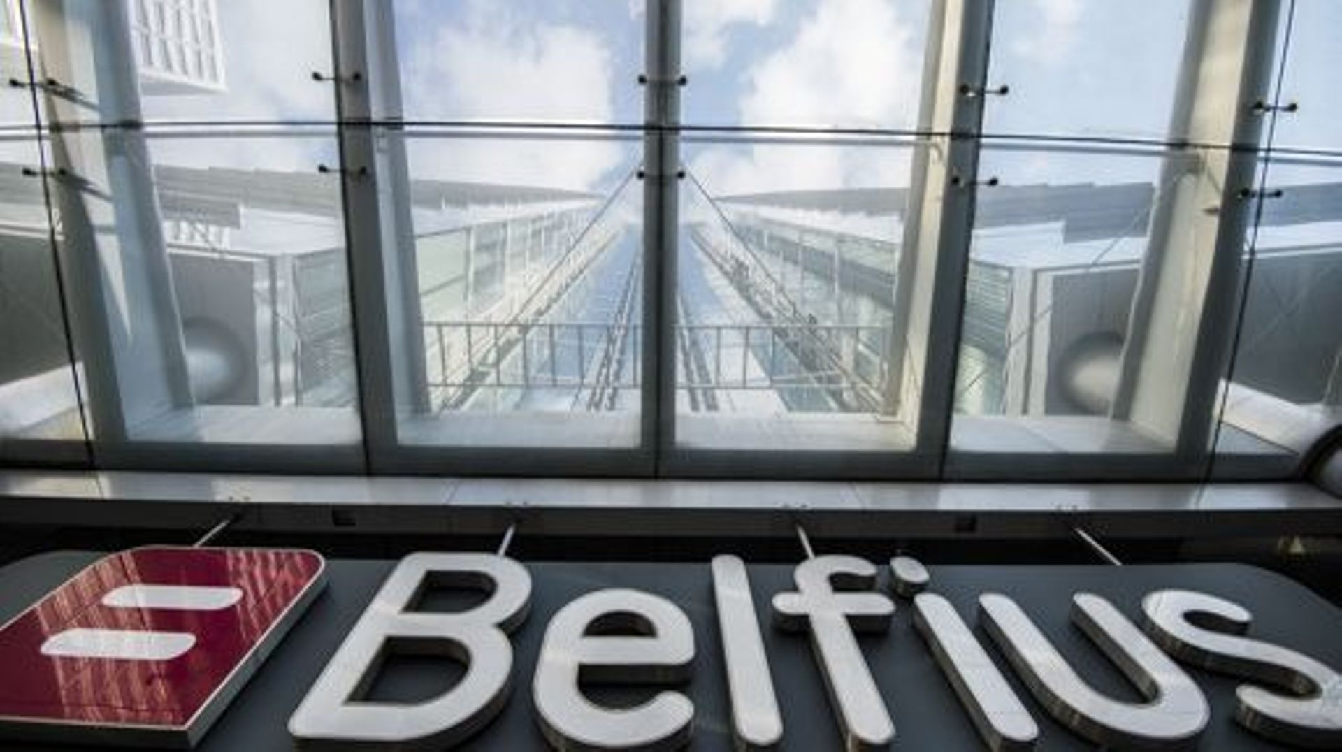 Illustration picture shows the entrance to the Belfius building and the logo ahead of a press conference of Belfius bank and insurance company to present the 2015 year results, Thursday 25 February 2016, at the Belfius headquarters in Brussels. BELGA PHOT