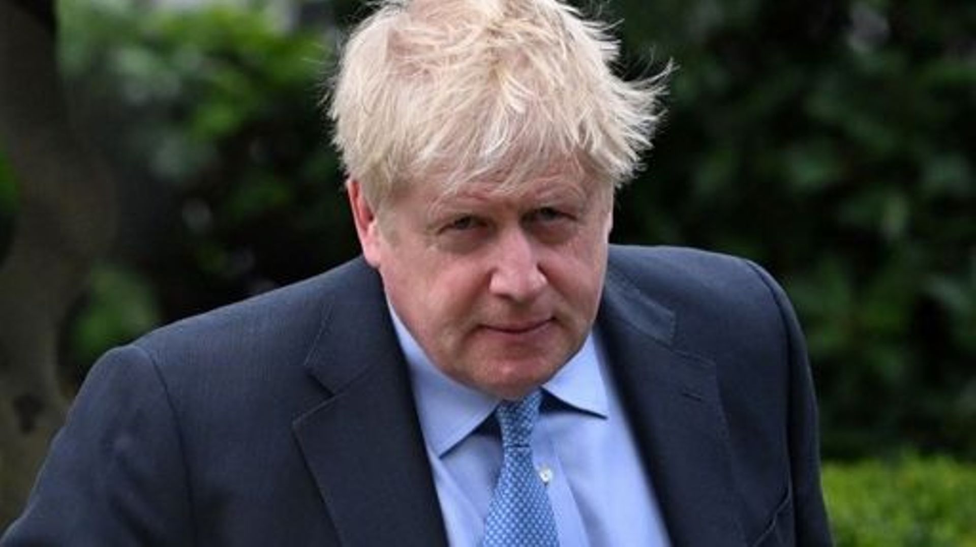 Former British Prime Minister Boris Johnson leaves his house in London on March 22, 2023. Britain’s former prime minister Boris Johnson re-enters the bear pit of parliamentary inquisition on Wednesday for a grilling about "Partygate" that could decide his
