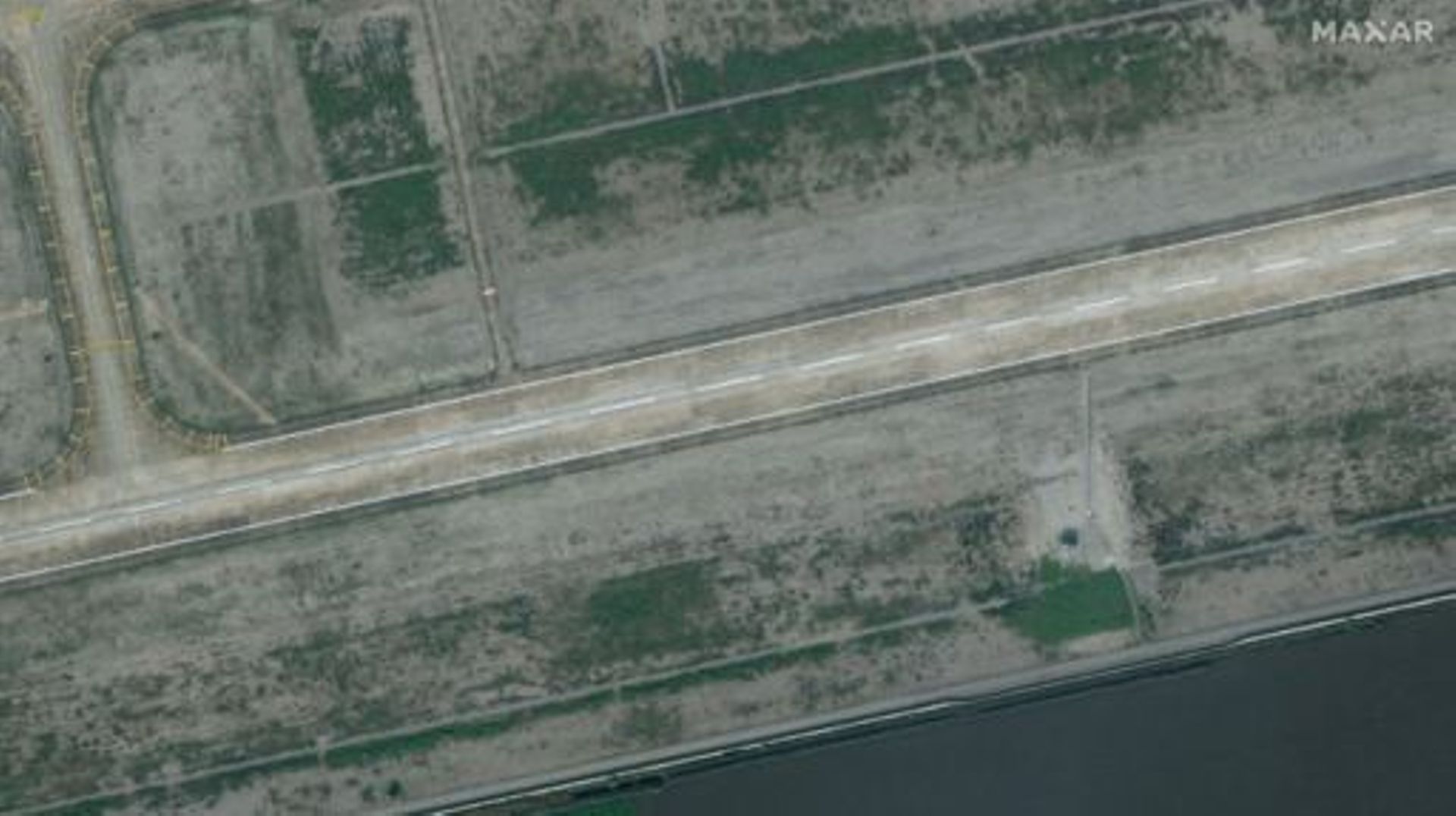 This handout satellite image courtesy of Maxar Technologies shows a Hatay airport runway in Hatay, Turkey on January 7, 2023, before an 7.8 magnitude earthquake which struck the region on February 6, 2023.  The death toll from the massive earthquake in Tu