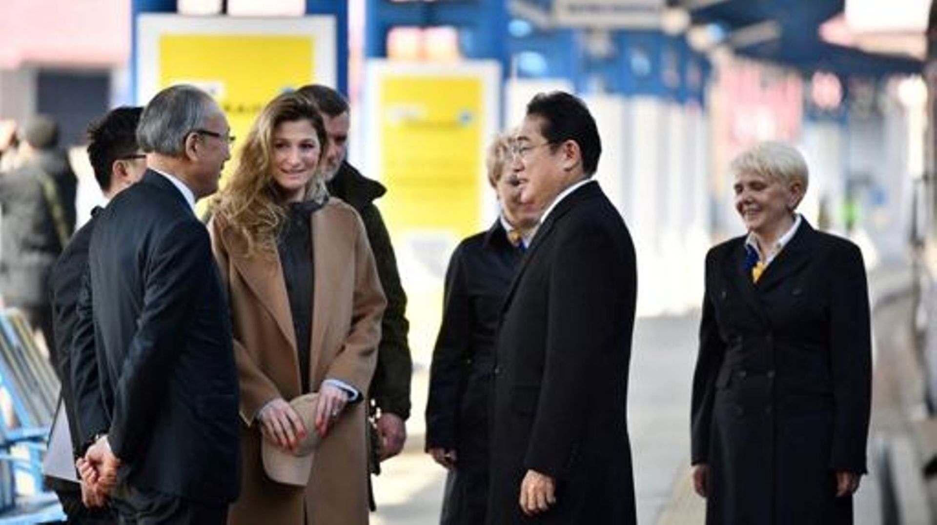 In this handout photo taken and released by the Ukrainian Foreign Ministry press service on March 21, 2023, shows Ukraine’s Deputy Foreign Affairs Minister of Ukraine Emine Dzhaparova (2nd L) welcoming Japan’s Prime Minister Fumio Kishida (2nd R) during h