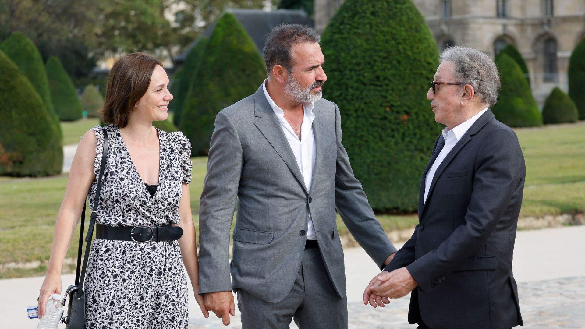 L’acteur Jean Dujardin, son épouse la danseuse sur glace Nathalie Pechalat et l’animateur de télévision Michel Drucker