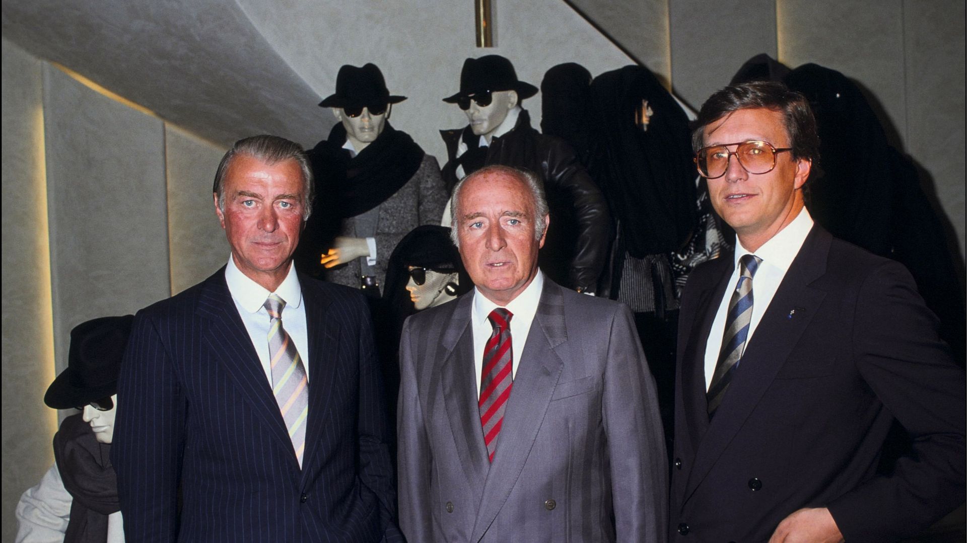 Roberto, Georgio et Maurizio Gucci à l'ouverture d'un nouveau magasin à Paris, en 1983.