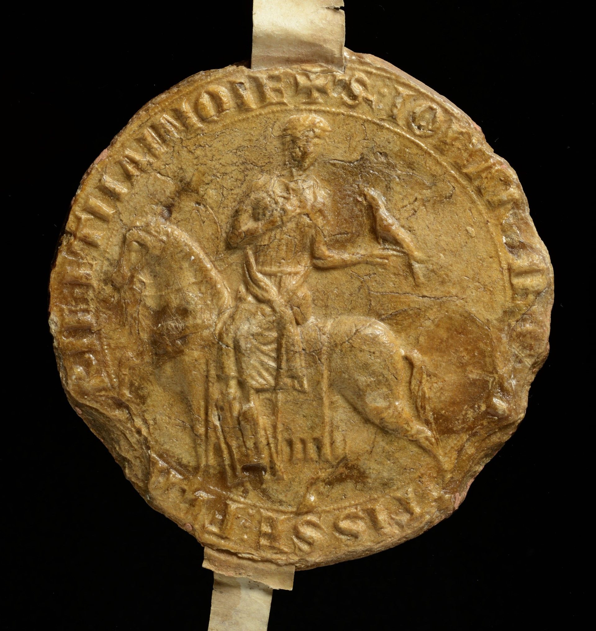 Un grand sceau équestre de chasse de Jeanne de Constantinople avec un faucon sur
le poing (sceau appendu à une charte de 1218, Archives de l’État à Gand, Fonds
Saint-Genois, n°12).