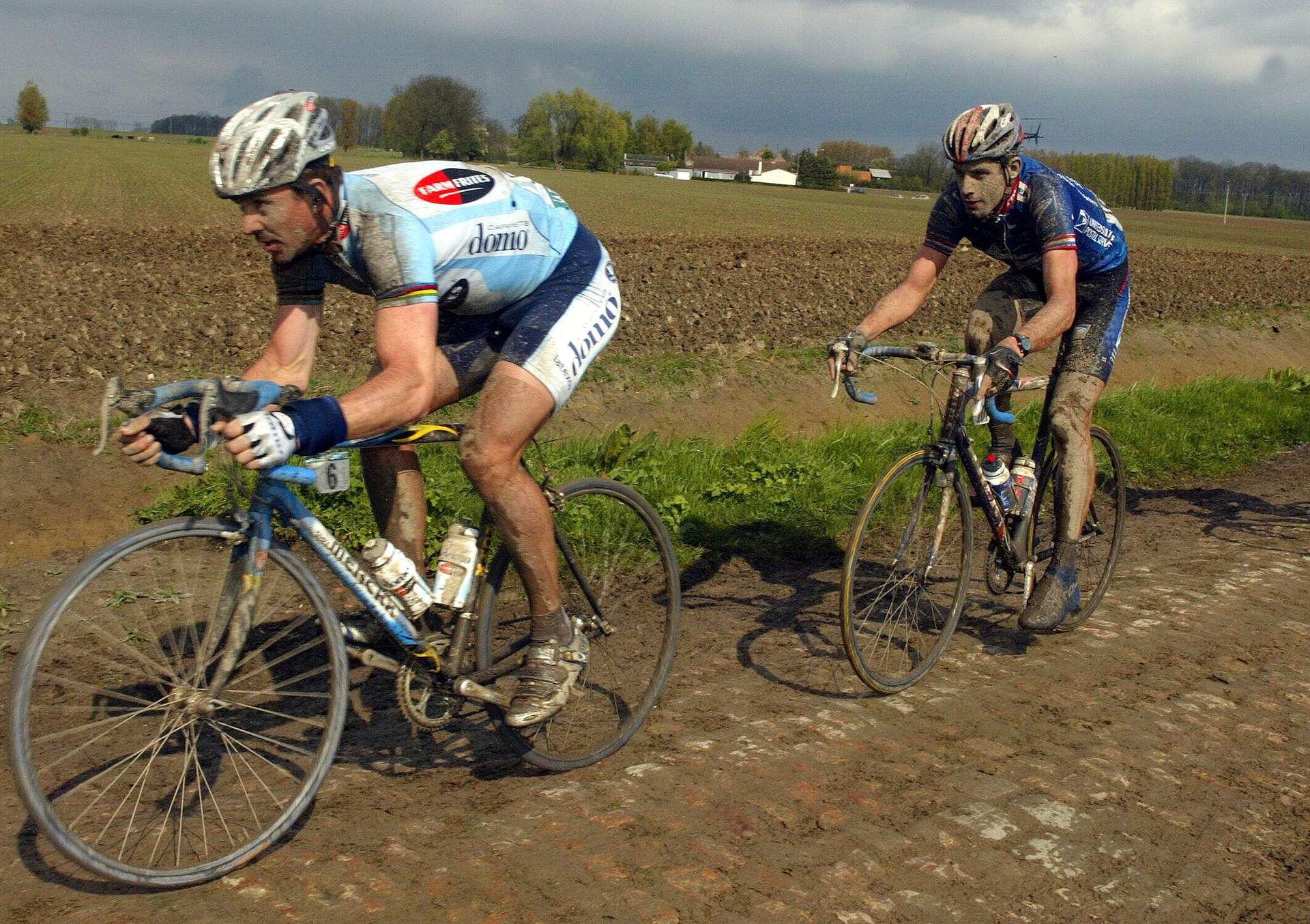 Johan Museeuw suivi par Tom Boonen : comme une transmission de sceptre...