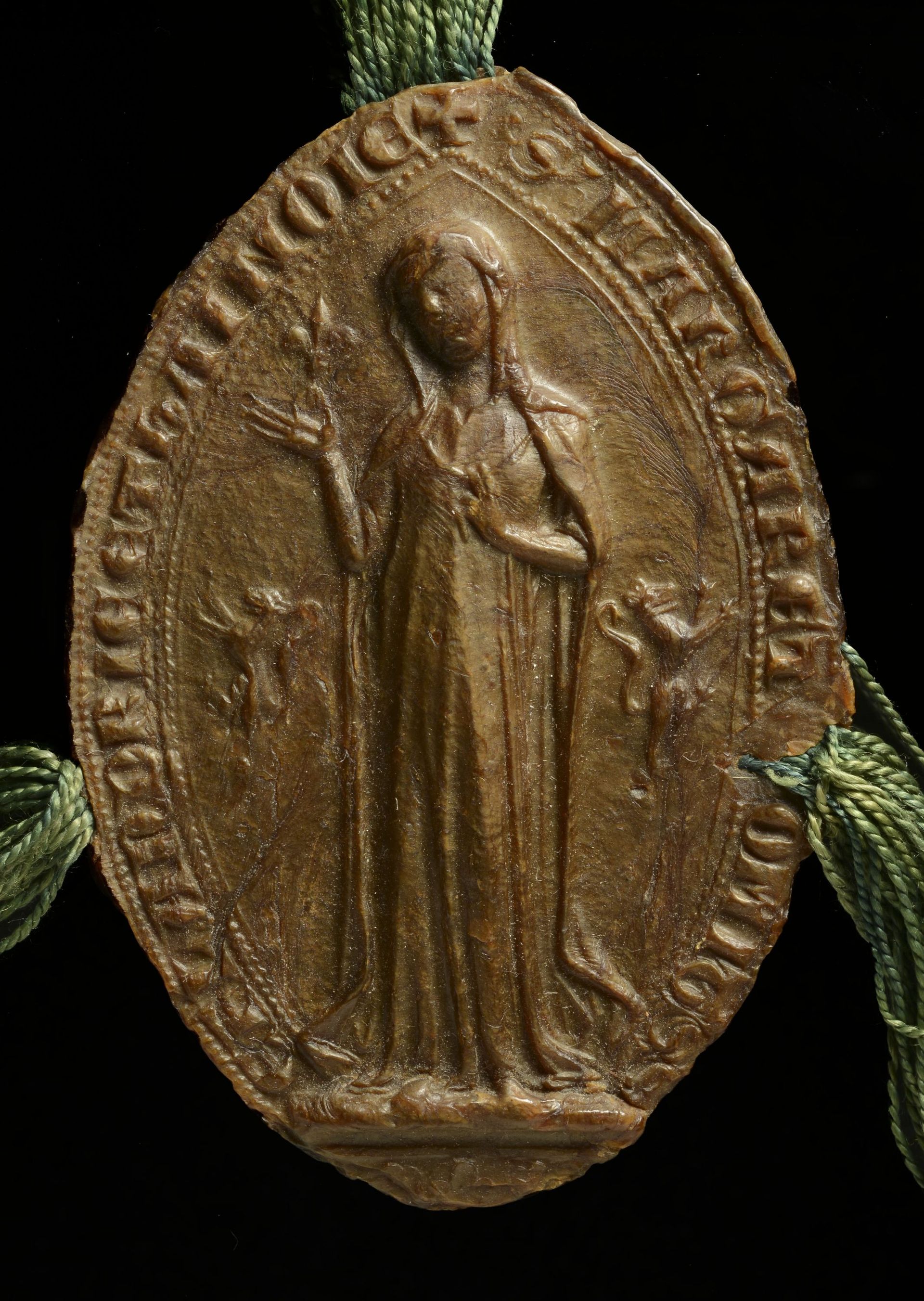 Un sceau pédestre de Marguerite de Constantinople avec une fleur de lis (sceau
appendu à une charte de 1278, Archives de l’État à Gand, Fonds Saint-Genois, n°240).