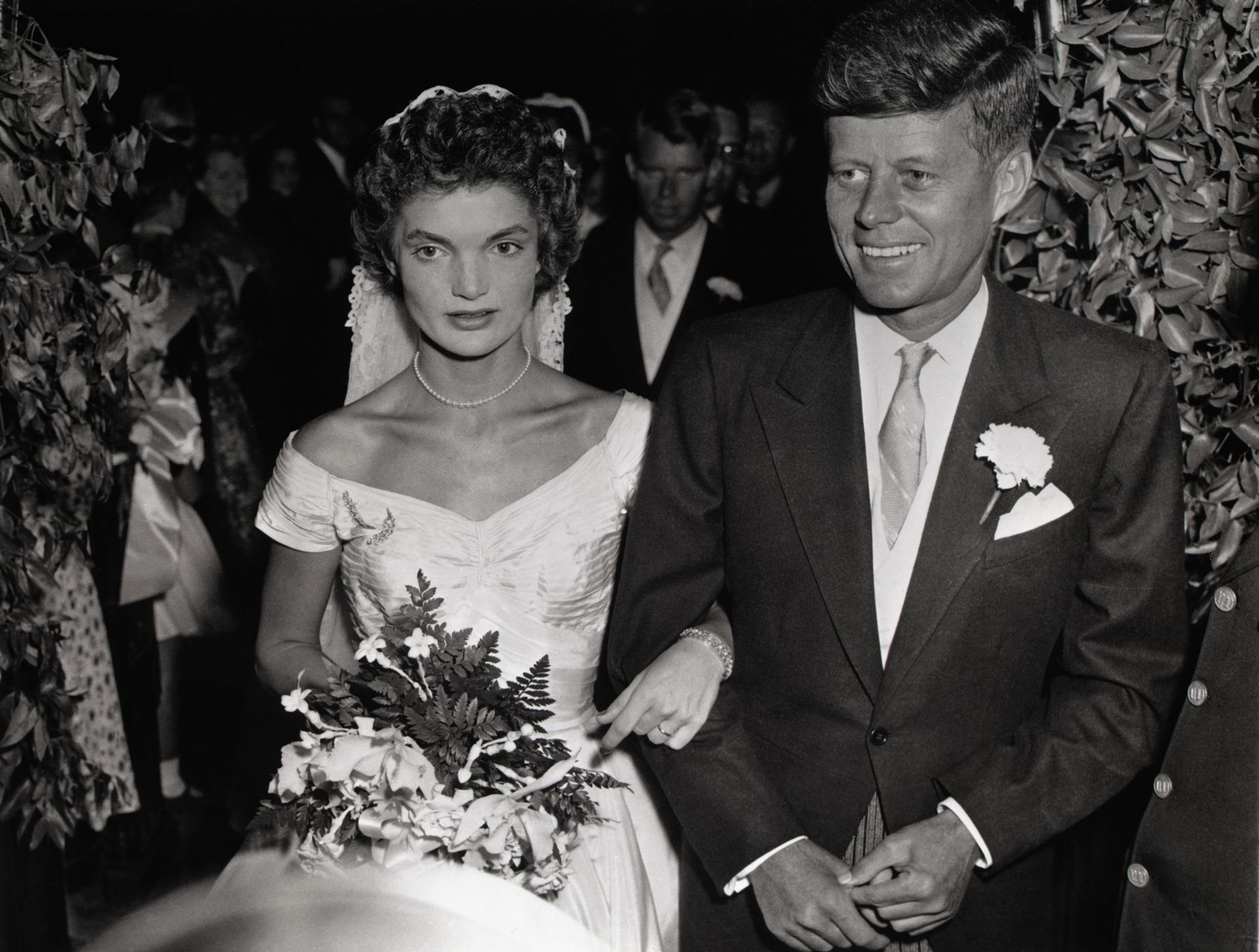 Mr. and Mrs. John F. Kennedy Walking Arm in Arm
