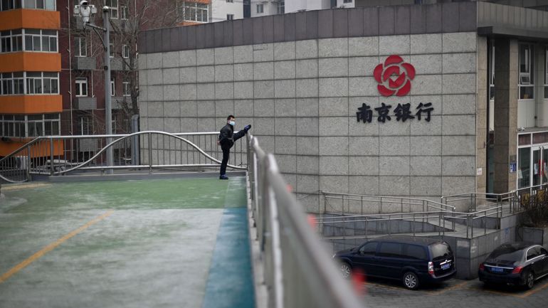 Coronavirus en Chine: nouvelles restrictions à Pékin, aux airs de ville fantôme